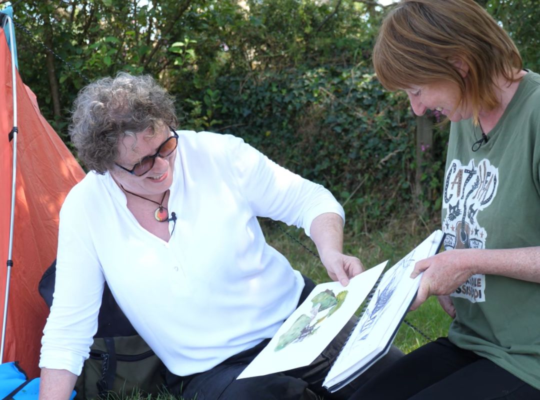 Anita Reynolds interviewing an art student
